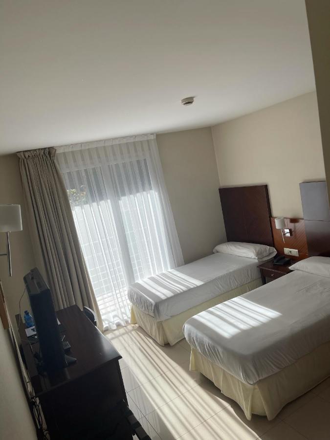 Hotel Mu La Cortinada Екстериор снимка